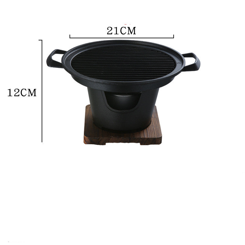 Vinzona portable indoor non-stick smokeless tabletop BBQ grill with cooking surface and control knobs for home use.