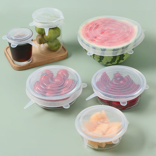 Six reusable Vinzona silicone stretch lids covering bowls, plates, and containers for food storage and freshness.