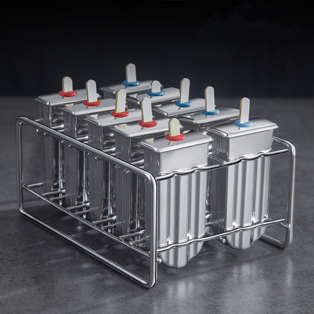 Stainless steel ice cream molds by Vinzona for making reusable homemade popsicles and ice pops in a kitchen setting.