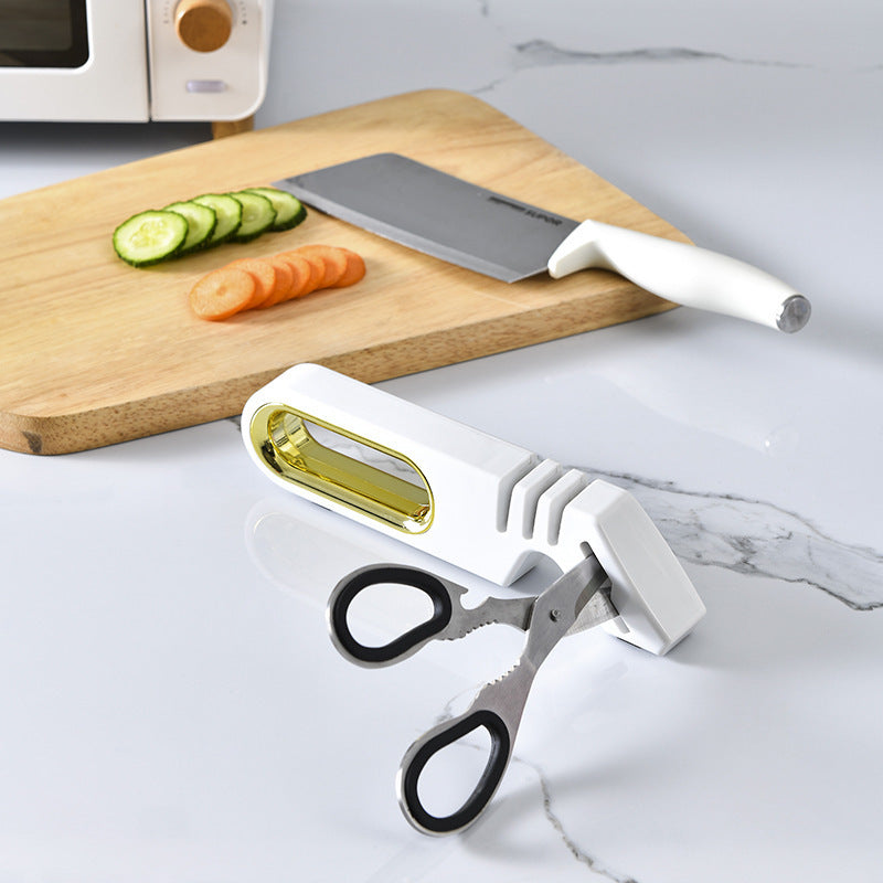 Vinzona 4-in-1 manual knife sharpener with multi-stage grinding stones for kitchen knife sharpening and care.
