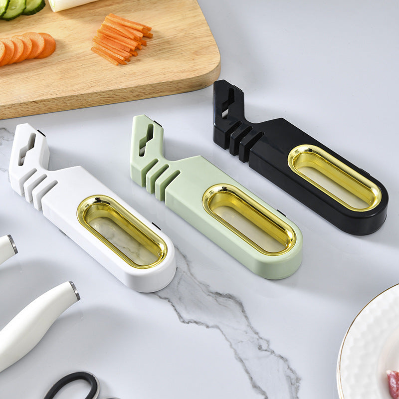Vinzona 4-in-1 manual knife sharpener with multi-stage grinding stones for kitchen knife sharpening and care.