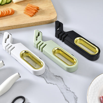 Vinzona 4-in-1 manual knife sharpener with multi-stage grinding stones for kitchen knife sharpening and care.