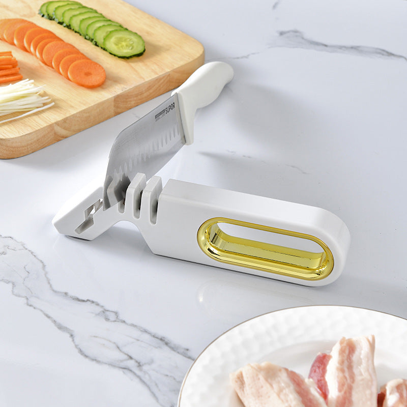 Vinzona 4-in-1 manual knife sharpener with multi-stage grinding stones for kitchen knife sharpening and care.